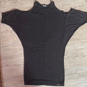 Melodia designs, cold shoulder dress. Fitted through the hips.